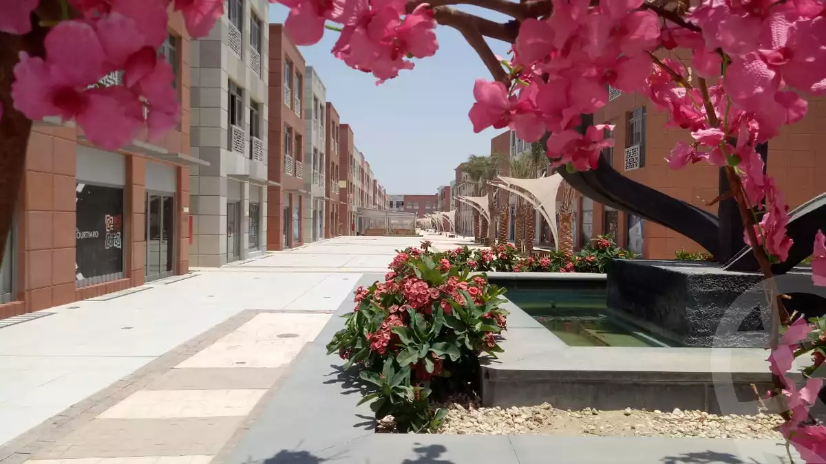 https://aqarmap.com.eg/ar/listing/6237997-for-sale-cairo-el-sheikh-zayed-city-compounds-the-courtyard-mall-dorra