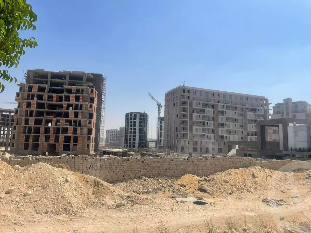 https://aqarmap.com.eg/ar/listing/6480650-for-sale-cairo-el-sheikh-zayed-city-compounds-canal-walk-island-205-compound-arkan-palm