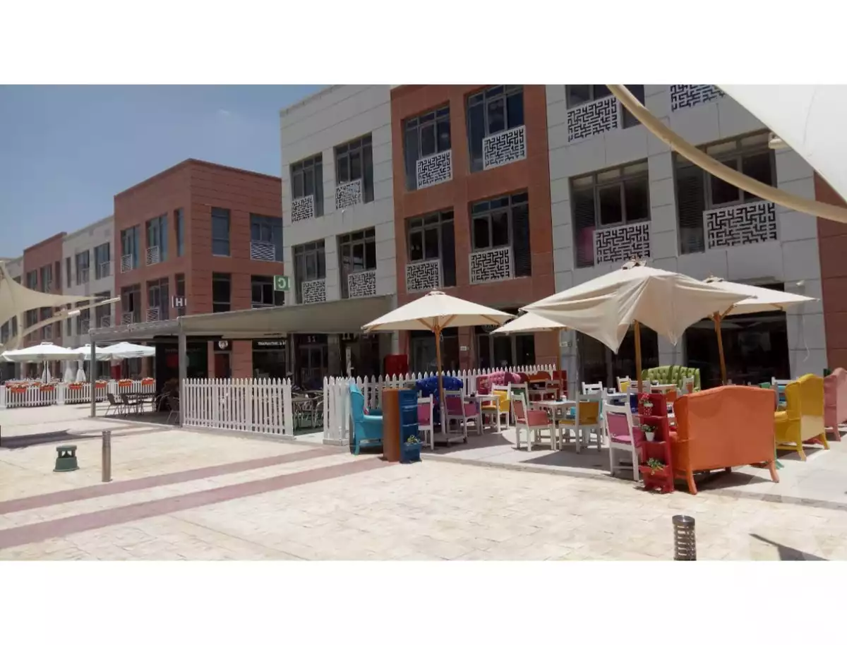 https://aqarmap.com.eg/ar/listing/6624592-for-sale-cairo-el-sheikh-zayed-city-compounds-the-courtyard-mall-dorra