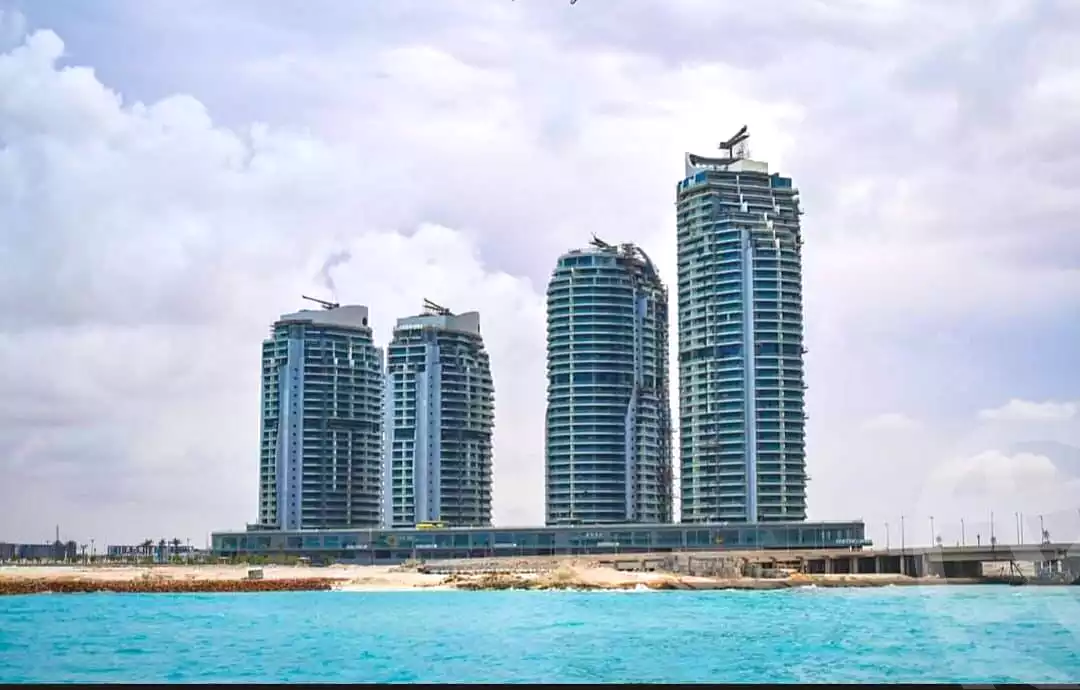 https://aqarmap.com.eg/ar/listing/7114786-for-sale-north-coast-new-alamein-mntj-t-l-lmyn-ljdyd-beachfront-tower-city-edge
