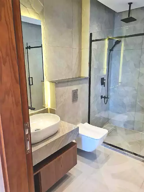 https://aqarmap.com.eg/ar/listing/7284778-for-sale-cairo-el-sheikh-zayed-city-compounds-kmbwnd-wyst-twn-swdyk