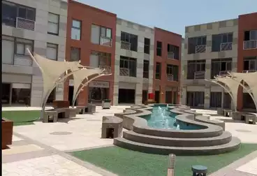 https://aqarmap.com.eg/ar/listing/4972398-for-sale-cairo-el-sheikh-zayed-city-compounds-the-courtyard-mall-dorra