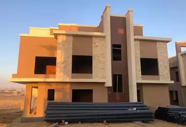 Twin house for sale in Toya Compound, Sheikh Zayed, immediate delivery in installments