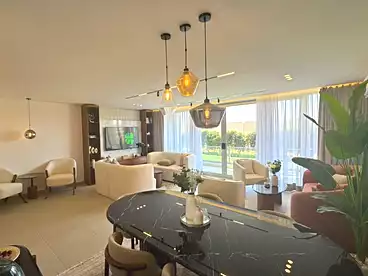 Apartment with Garden For sale in Mar Ville Compound - AlMarasem, Expansion Of El Sheikh Zayed City, 136 sqm