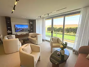 Apartment with Garden For sale in Mar Ville Compound - AlMarasem, Expansion Of El Sheikh Zayed City, 136 sqm