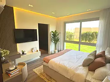 Apartment with Garden For sale in Mar Ville Compound - AlMarasem, Expansion Of El Sheikh Zayed City, 96 sqm