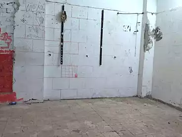 تجاري للإيجار في شارع عثمان محرم، الطالبية، 7 متر